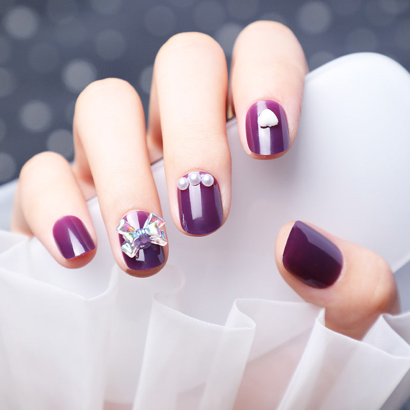 Wearing Nails With Diamonds And Purple Fake Nails - Fashionner
