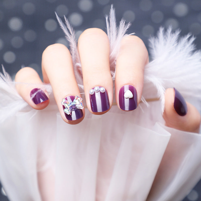 Wearing Nails With Diamonds And Purple Fake Nails - Fashionner