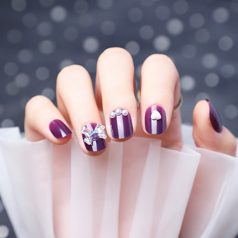 Wearing Nails With Diamonds And Purple Fake Nails - Fashionner