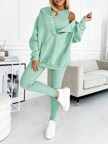 Ensemble trois pièces athleisure : sweat à capuche, gilet ajusté et pantalon à fil épais