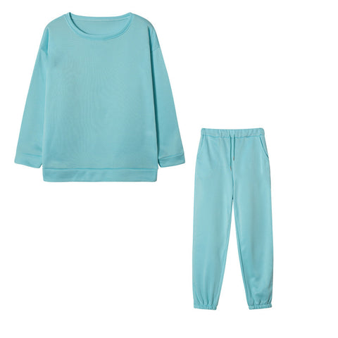 Ensemble sweat à capuche deux pièces de couleur unie pour femmes, style athleisure.
