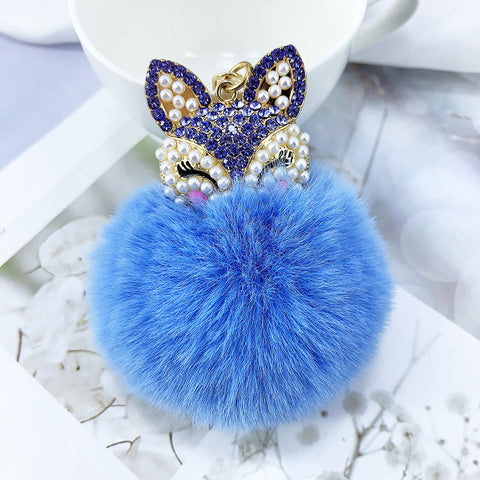 Porte-clés pendentif en alliage, perles, strass et fourrure de renard