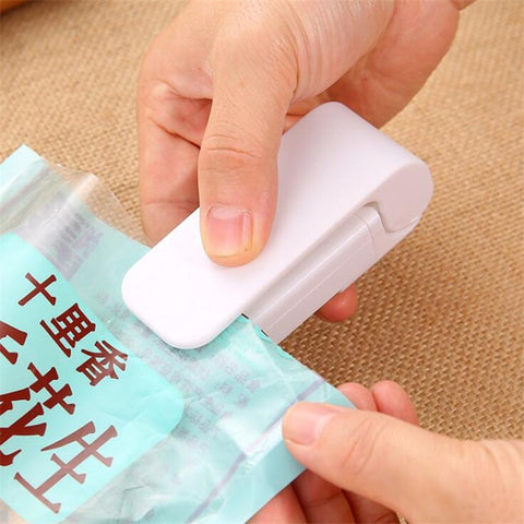 Clip alimentaire domestique mini-scelleuse portative pour sacs en plastique à collation
