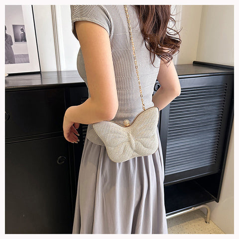 Sac bandoulière en métal pour femme à motif papillon, rayures et bouton-pression