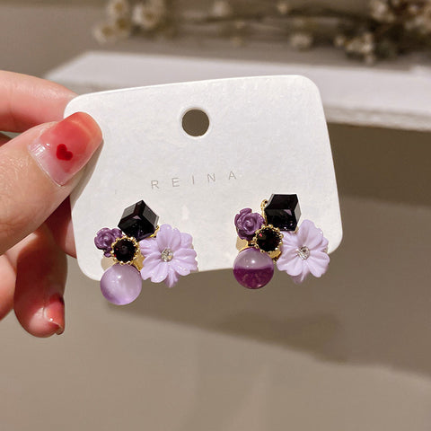 Buy Korean East Gate Diamond Cat''S Eye Crystal Flower Earrings online at Fashionner.