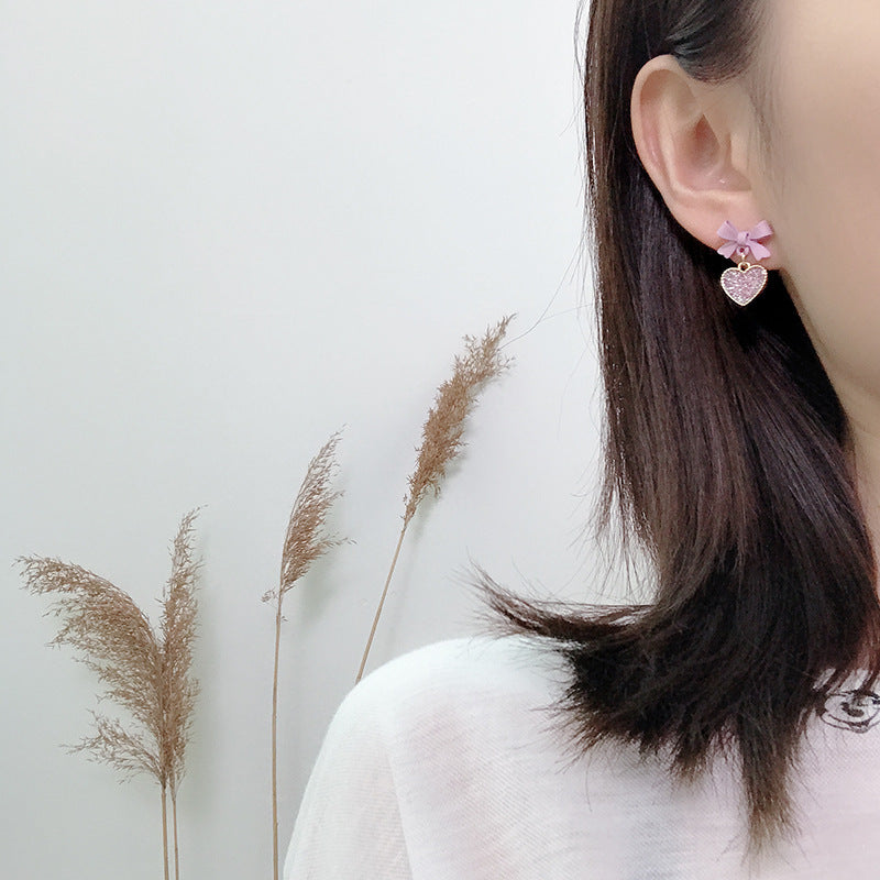 Buy New Korean Style Purple Bow Sequin Love Heart Clip On Earrings Sweet online at Fashionner.