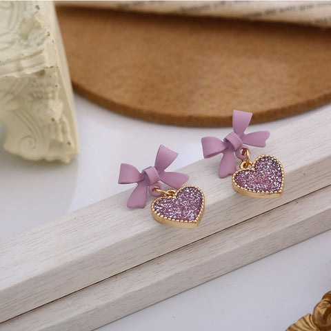 Buy New Korean Style Purple Bow Sequin Love Heart Clip On Earrings Sweet online at Fashionner.