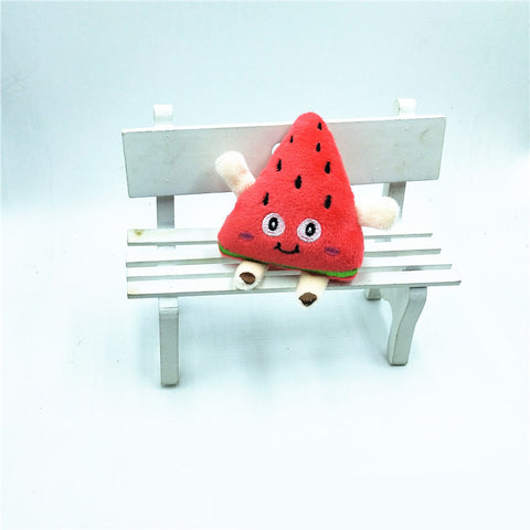 Pendentif poupée en peluche