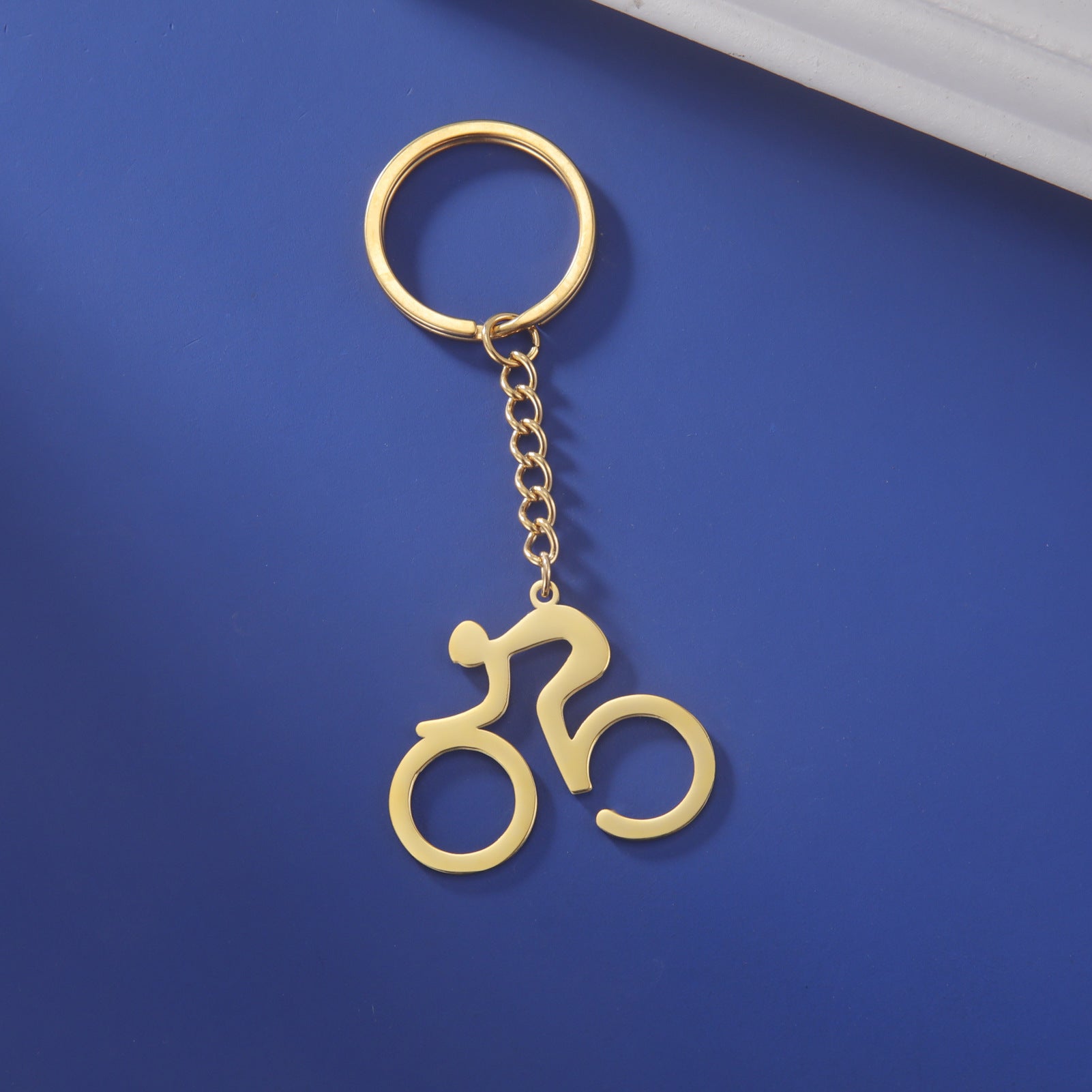 Gexiang Factory Titanium Steel Cutting Hollow 18K Real Gold Electroplating Simple Stroke Bicycle Pendant Stainless Steel Key Ring
