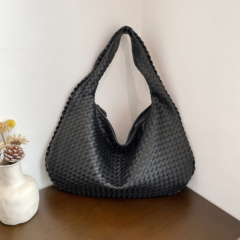 Sac tissé haut de gamme français pour femme, sac polyvalent à bandoulière ou à l'épaule, sac de transport transfrontalier texturé de niche, portable pour les trajets quotidiens