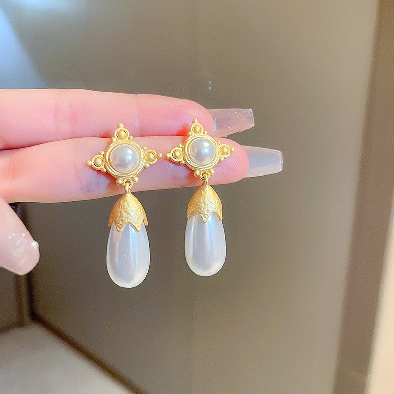 Buy Silver Needle Metal Tassel Earrings For Women Round Flower Vintage Retro Studs online at Fashionner.