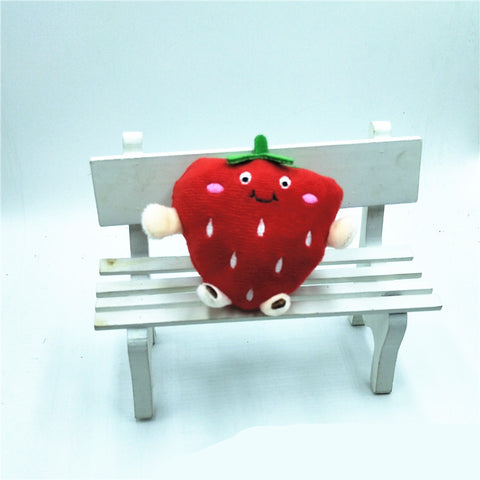 Pendentif poupée en peluche