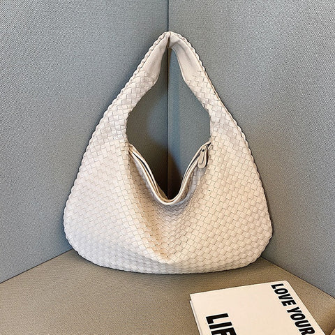 Sac tissé haut de gamme français pour femme, sac polyvalent à bandoulière ou à l'épaule, sac de transport transfrontalier texturé de niche, portable pour les trajets quotidiens