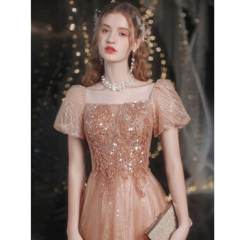 Robe de soirée dorée à manches bouffantes pour femme