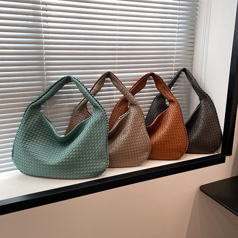Sac tissé haut de gamme français pour femme, sac polyvalent à bandoulière ou à l'épaule, sac de transport transfrontalier texturé de niche, portable pour les trajets quotidiens