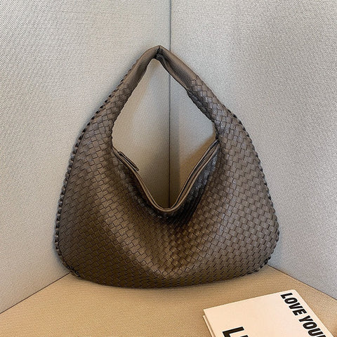 Sac tissé haut de gamme français pour femme, sac polyvalent à bandoulière ou à l'épaule, sac de transport transfrontalier texturé de niche, portable pour les trajets quotidiens