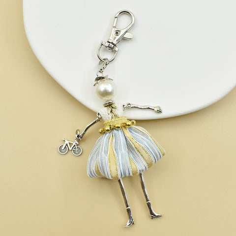 Porte-clés pour femme, pendentif de sac à main fait à la main avec personnage de dessin animé