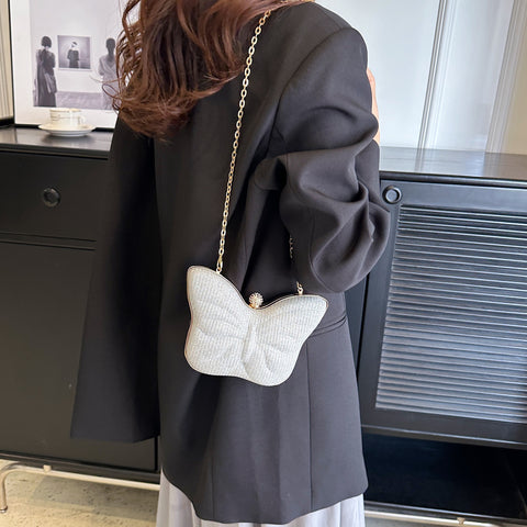Sac bandoulière en métal pour femme à motif papillon, rayures et bouton-pression