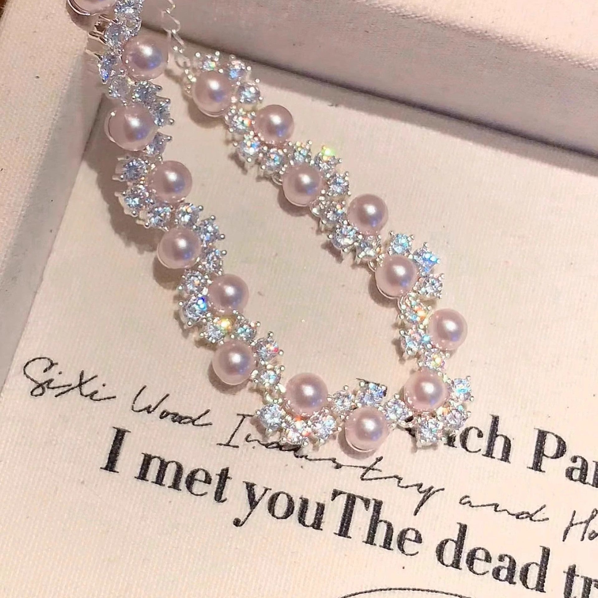 Buy Exquisite French-Style Sparkling Diamond And Pearl Bracelet For Women online at Fashionner.