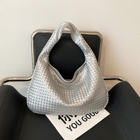 Sac tissé haut de gamme français pour femme, sac polyvalent à bandoulière ou à l'épaule, sac de transport transfrontalier texturé de niche, portable pour les trajets quotidiens