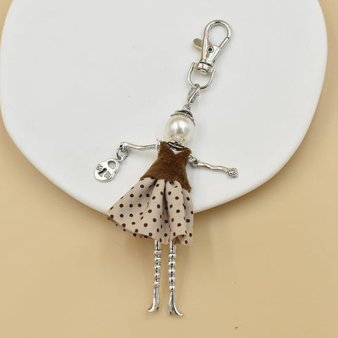 Porte-clés pour femme, pendentif de sac à main fait à la main avec personnage de dessin animé