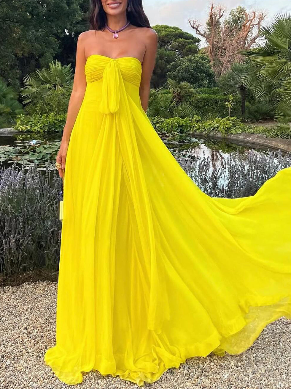 Buy Yellow Strapless Bow Tie Maxi Dress online at Fashionner.