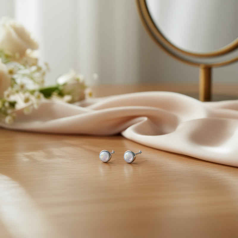 Buy Platinum Stud Earrings With A Classic Opal Bezel Setting online at Fashionner.
