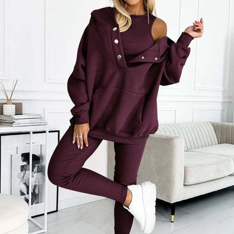 Ensemble trois pièces athleisure : sweat à capuche, gilet ajusté et pantalon à fil épais
