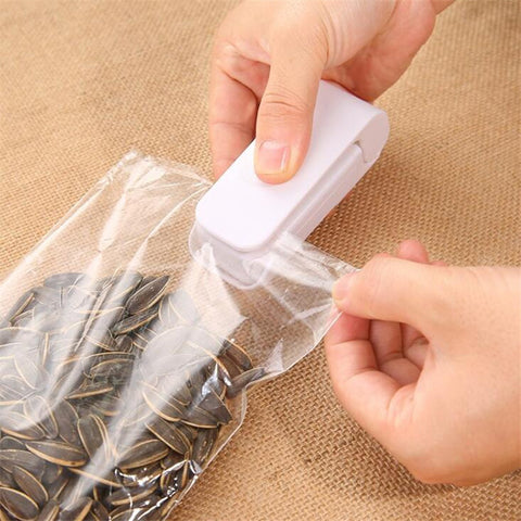 Clip alimentaire domestique mini-scelleuse portative pour sacs en plastique à collation