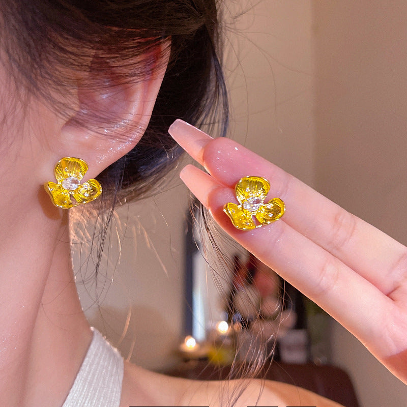Buy Golden Small Flower Stud Earrings For Women online at Fashionner.