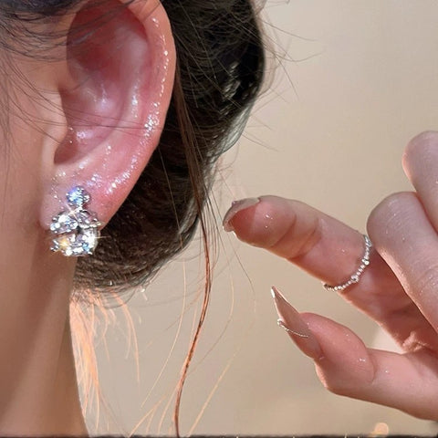Buy Flashy Saturn Womens Light-Luxury Ear Studs online at Fashionner.