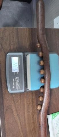Bâton de massage en bois