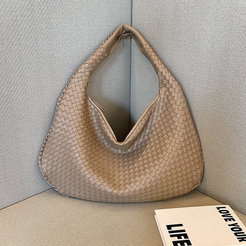 Sac tissé haut de gamme français pour femme, sac polyvalent à bandoulière ou à l'épaule, sac de transport transfrontalier texturé de niche, portable pour les trajets quotidiens