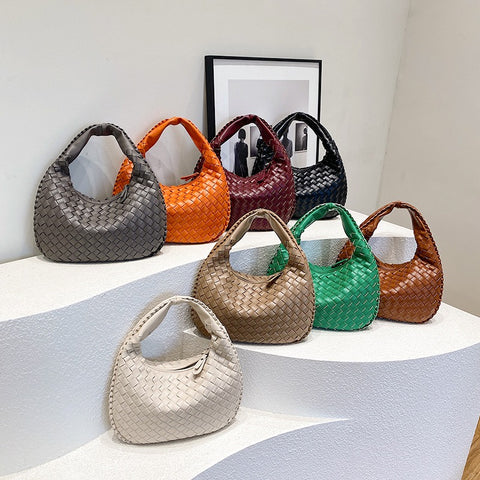 Sac tissé haut de gamme français pour femme, sac polyvalent à bandoulière ou à l'épaule, sac de transport transfrontalier texturé de niche, portable pour les trajets quotidiens