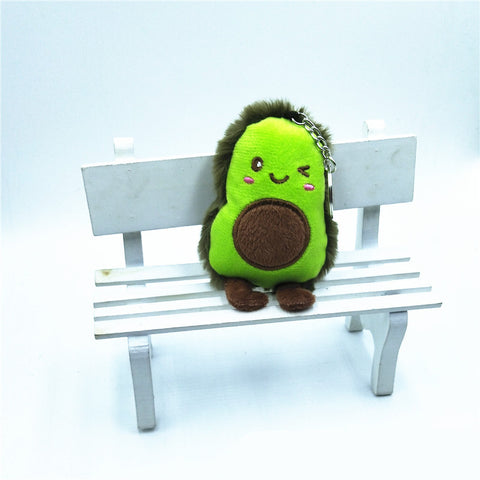 Pendentif poupée en peluche