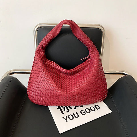 Sac tissé haut de gamme français pour femme, sac polyvalent à bandoulière ou à l'épaule, sac de transport transfrontalier texturé de niche, portable pour les trajets quotidiens