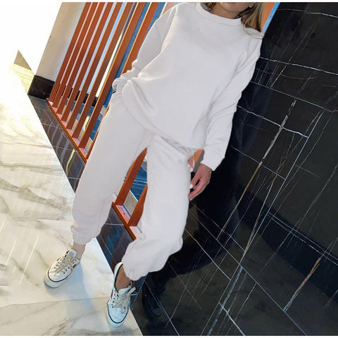 Ensemble sweat à capuche deux pièces de couleur unie pour femmes, style athleisure.