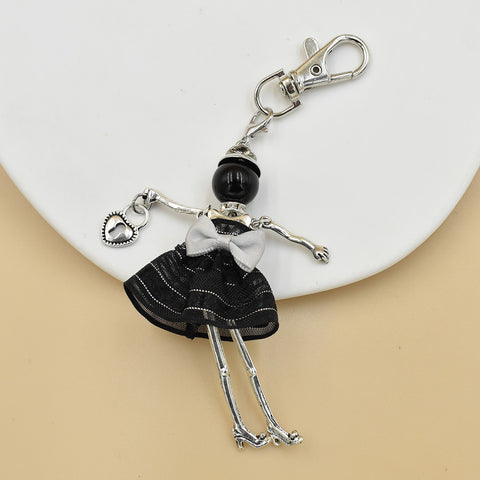 Porte-clés pour femme, pendentif de sac à main fait à la main avec personnage de dessin animé