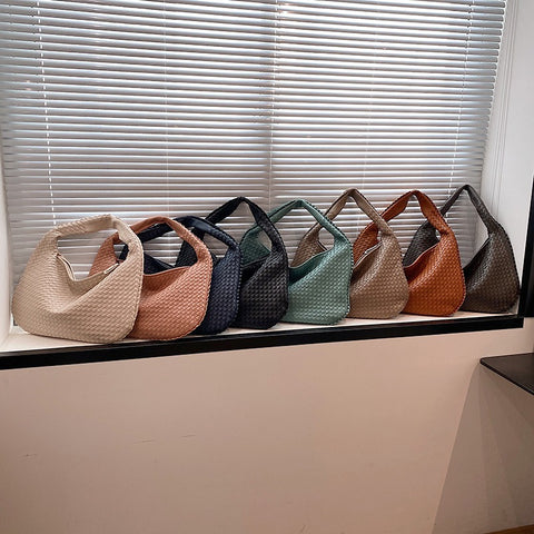 Sac tissé haut de gamme français pour femme, sac polyvalent à bandoulière ou à l'épaule, sac de transport transfrontalier texturé de niche, portable pour les trajets quotidiens