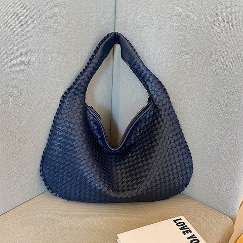 Sac tissé haut de gamme français pour femme, sac polyvalent à bandoulière ou à l'épaule, sac de transport transfrontalier texturé de niche, portable pour les trajets quotidiens