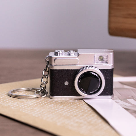 Porte-clés lumineux LED d'appareil photo miniature en trois dimensions