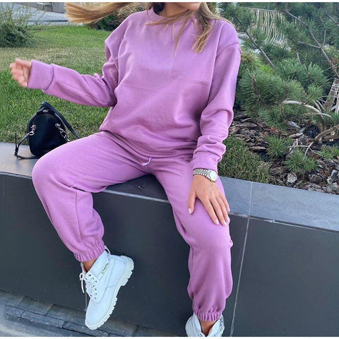 Ensemble sweat à capuche deux pièces de couleur unie pour femmes, style athleisure.