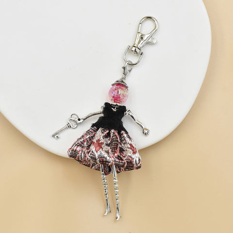 Porte-clés pour femme, pendentif de sac à main fait à la main avec personnage de dessin animé