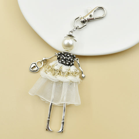 Porte-clés pour femme, pendentif de sac à main fait à la main avec personnage de dessin animé