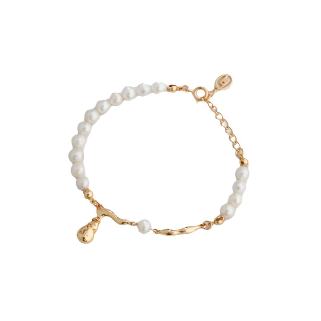 Buy Fashionable Adjustable Pearl-Style Waterdrop Bracelet online at Fashionner.
