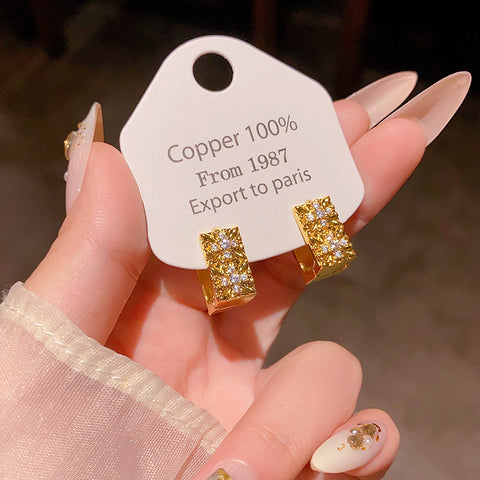 Buy Ultra-Shimmering Zircon Geometric Stud Earrings online at Fashionner.