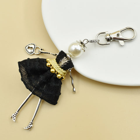 Porte-clés pour femme, pendentif de sac à main fait à la main avec personnage de dessin animé