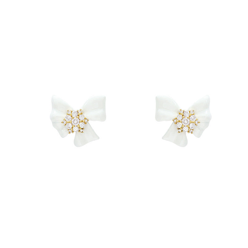 Buy French-Style Delicate White Bow Stud Earrings online at Fashionner.