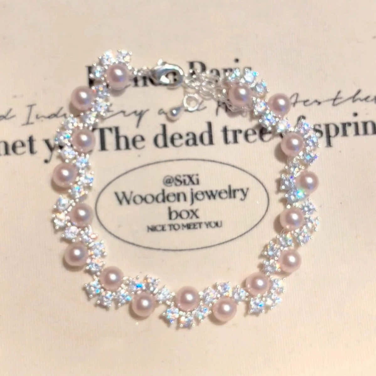 Buy Exquisite French-Style Sparkling Diamond And Pearl Bracelet For Women online at Fashionner.