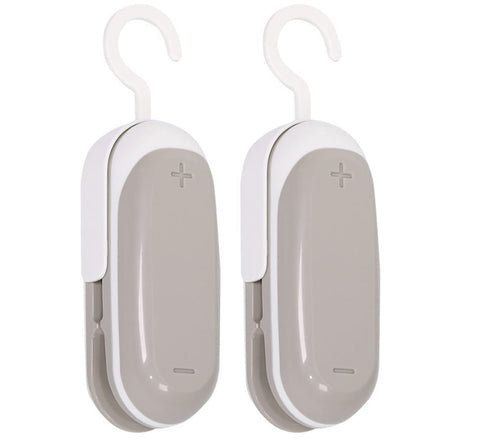 Lot de 2 mini scelleuses de sacs, scelleuses sous vide portables en plastique, mini scelleuse alimentaire 2 en 1 avec coupe-sac, pour sacs en plastique et conservation des aliments